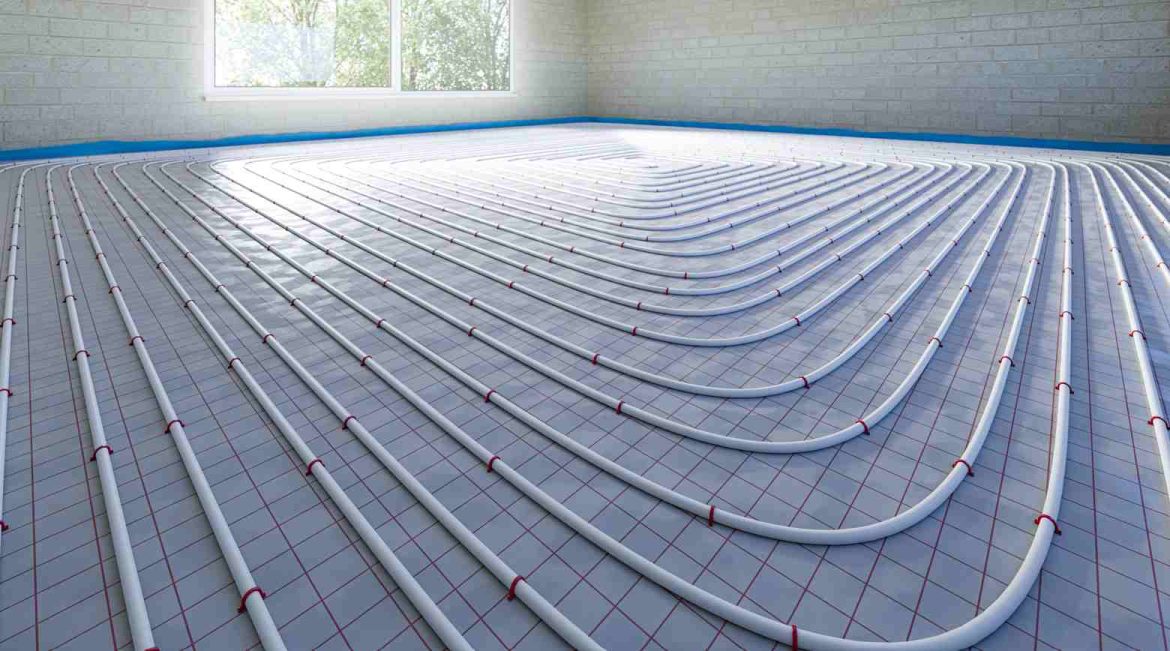 Vue d'ensemble des tubes installés en boucles géométriques sur l'isolant dans le cadre d'un guide pose plancher chauffant eau chaude.